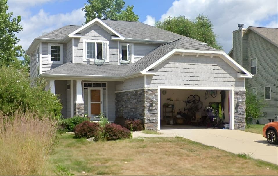 Complex Roof That is Broken Up Into Multiple Sections in Blue Mountain, ON — House Photo